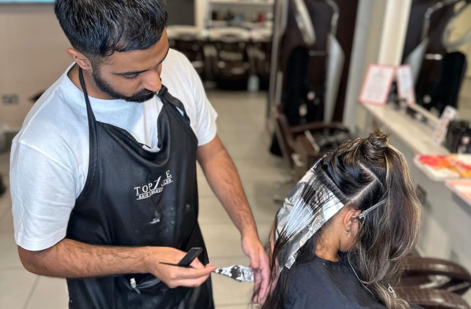 Hair colour application at salon