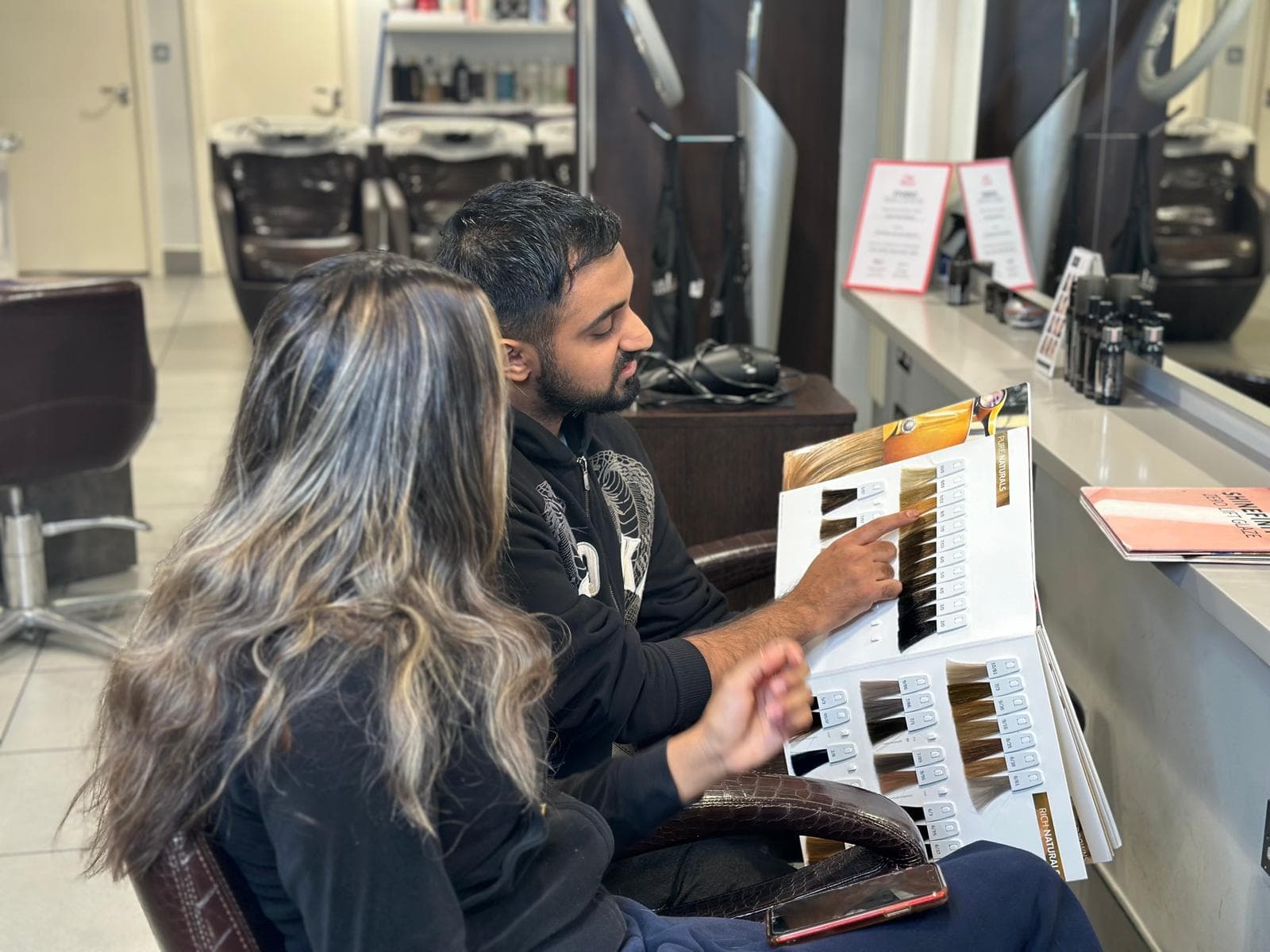Colour technician consultation at salon