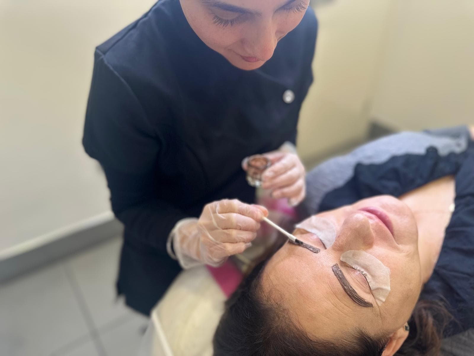 Tint being applied to brows